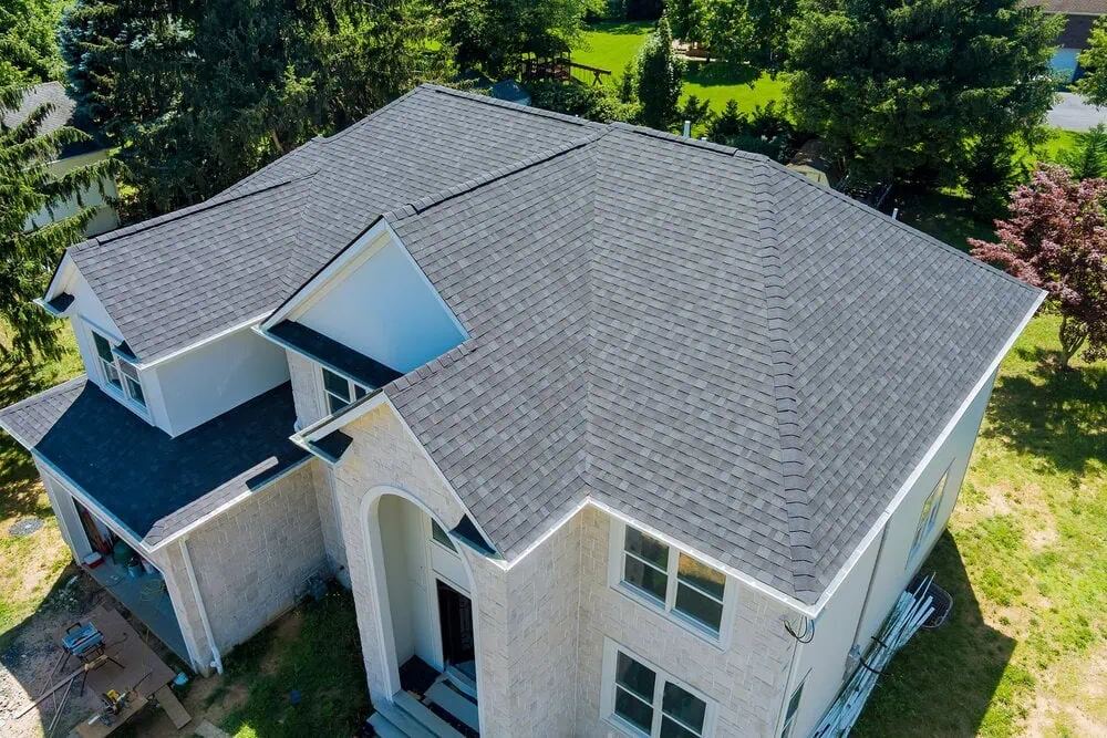 Kornacki Roofing & Contracting crew replacing a roof in Michigan City, IN