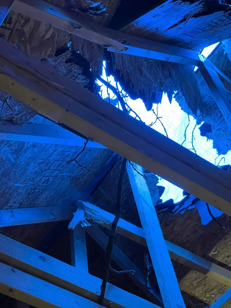 Storm damage roof repair in Valparaiso IN on multi pitch roof